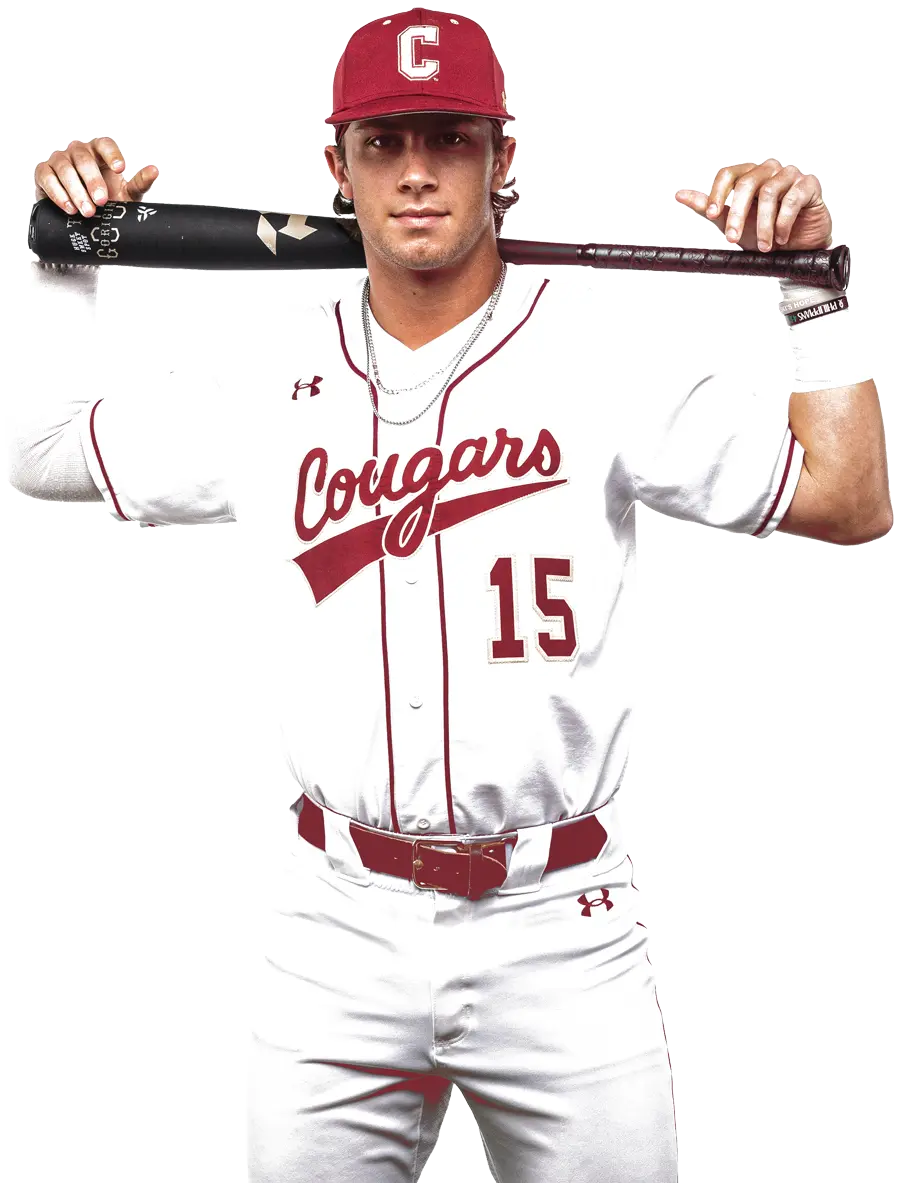 Baseball player posing with bat